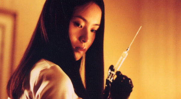 Asami with the syringe