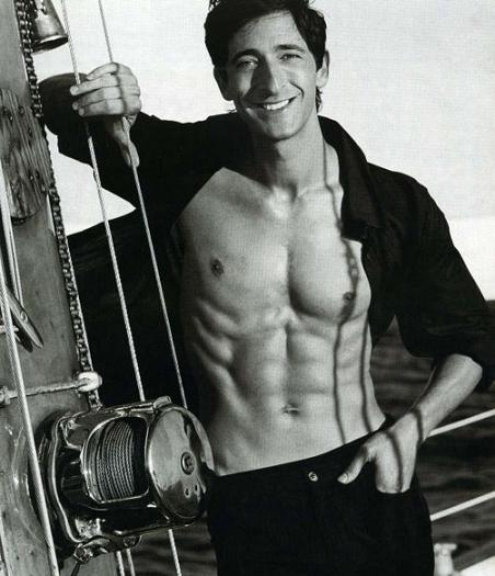 Adrian Brody with a six pack